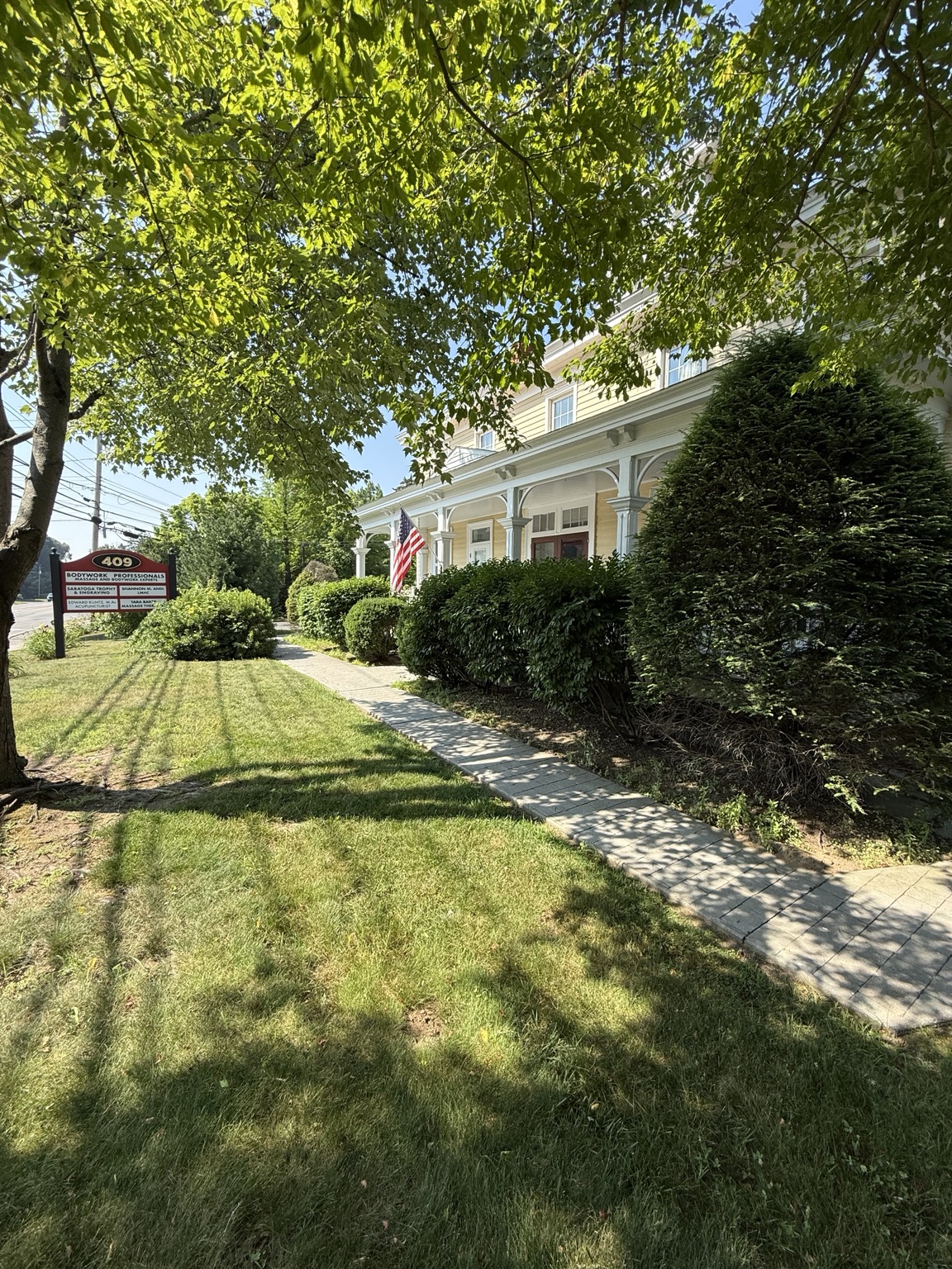 Commercial mulch installation and shrub trimming in Saratoga Springs