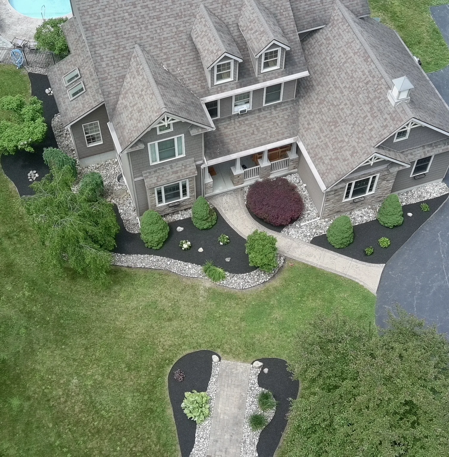 Overhead drone photo of full property landscape transformation