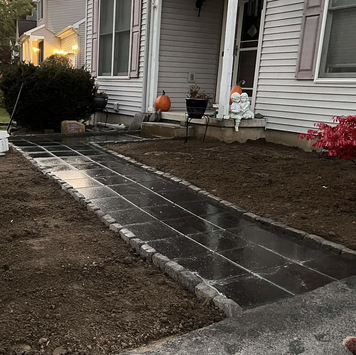 Completed black stone hardscape walkway