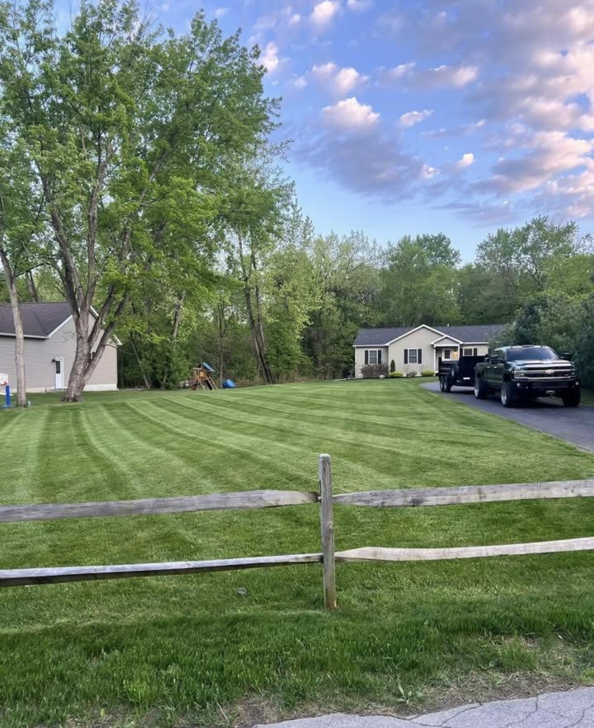 Striped lawn with truck