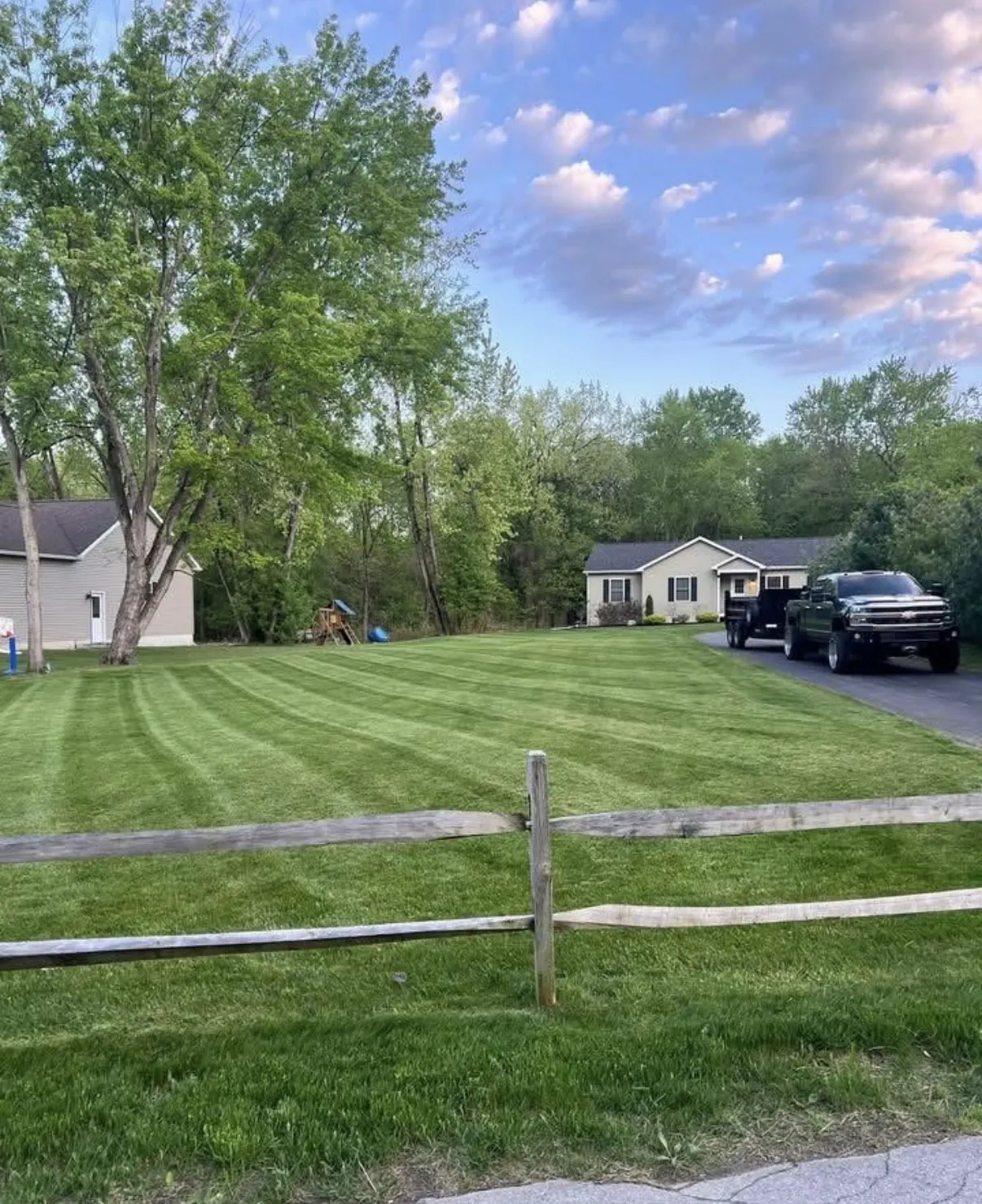 Striped lawn with truck